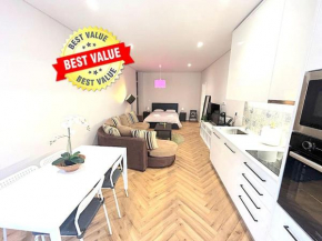 Heart of the City Suites - E